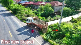 The first new project is to pour rock soil into a forest to make a garden in front of the school