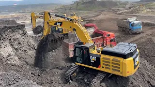 Two Caterpillar 352F Excavators Loading Coal On Trucks