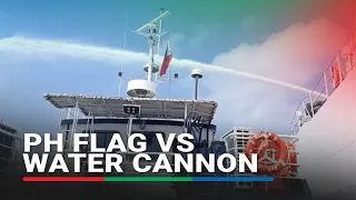 WATCH: Philippine flag takes direct hit from China water cannon