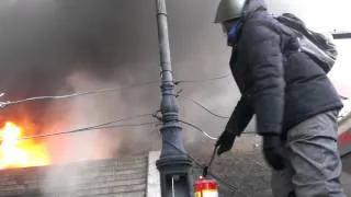 Feb. 18th, 2014, Kyiv: Maidan Self-Defense set firewall on October Palace stairway as police fire