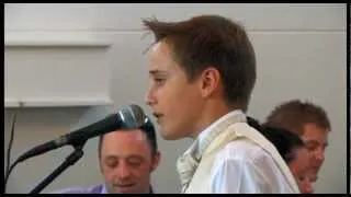 12 year old boy singing "Father and Son" at brother's wedding.