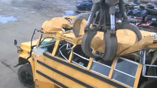 tearing apart a school bus
