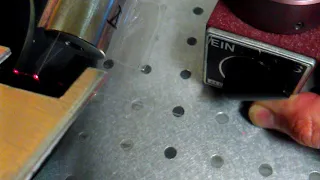 Touching a tapered fiber with a WGM resonator.