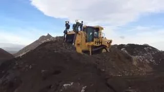 Caterpillar D9T Dozer And D7R Working Together