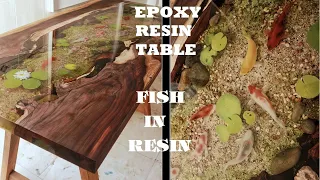 Amazing epoxy resin table of fish - Koi fish in epoxy resin.