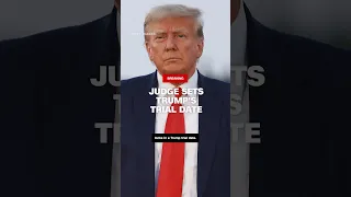 Judge sets Trump trial date