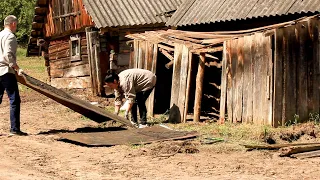 Renovation of an old village house. We demolish it according to plan. Collecting stones