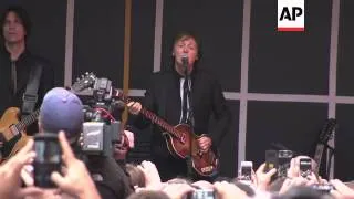 Sir Paul McCartney performs 'pop-up' concert for fans in Times Square