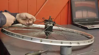 Lacing a bicycle wheel