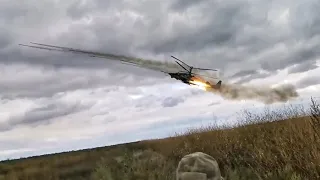 Ka-52 firing rockets and deploying Flares.