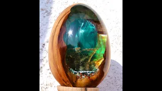 Woodturning-epoxy resin. A deep sea in a broken egg