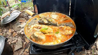 We set up a fresh fish stew camp and convention on the riverbank