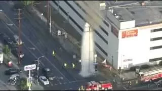 Ruptured Fire Hydrant Arcs With High Voltage Power Lines