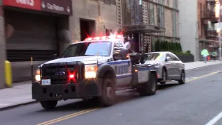 NYPD Police Tow Truck Towing A Car