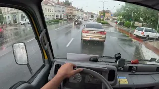 Rainy day Nissan Cabstar POV driving