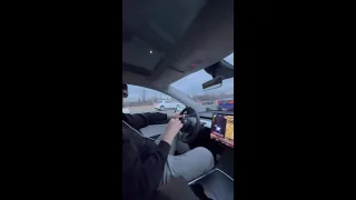 Man Drives Tesla While Wearing Apple Vision Pro