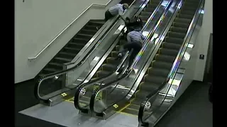 Woman in wheelchair tumbles down escalator at Portland airport