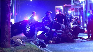 Woman pinned in vehicle after rollover crash