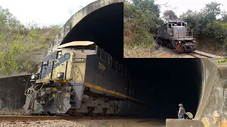 Locomotivas em força total acelerando em trecho de rampa na Rota do Calcário e Ferrovia do Aço