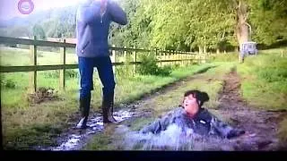 Vicar of Dibley jumps in puddle