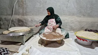 Cooking local bread in a traditional kitchen by Kabri