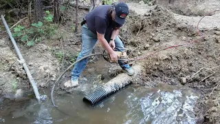 Cheap Easy Culvert fix to Unplug a Clogged Culvert Pipe.