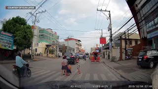 A car hits 2 girls crossing the pedestrian lane