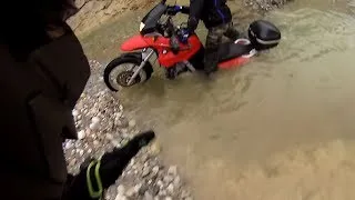 V-Strom helps Bmw f650gs when stuck in a river