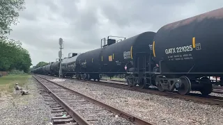 BNSF 6090 leads empty tanker train highballing Alvin tx