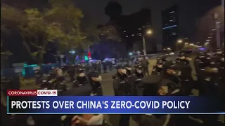 Protests over China's COVID controls spread across country
