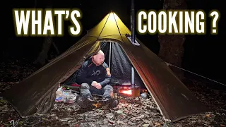Winter hot tent camping: Woodstove cooking.