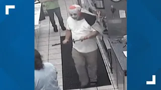 Robber in clown mask robs Monroe County store with sword