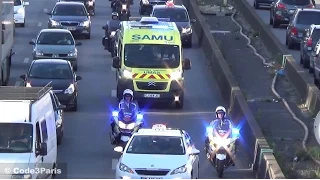 Police Motorcycles Escort Ambulance Through Heavy Traffic