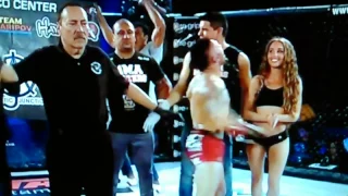 MMA Fighter punches ring girl