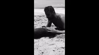 Matthias Schoenaerts pup play at the beach