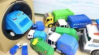 Blue and Green Garbage Truck get thrown into Takilong's Big Hole Work Car Toy