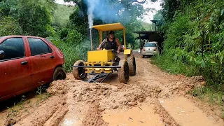 USEI O MINI TRATOR PARA LIMPAR UM DESLIZAMENTO DE LAMA NO MEU SÍTIO.