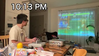 I’m 50-year-old Japanese man fighting with midlife crisis. I play retro games on a projector.