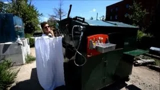 US artist turns dumpster into a home