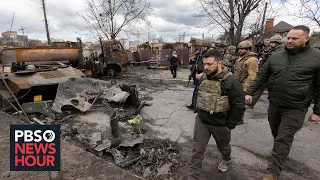 What international crimes are Russians committing in Ukraine?