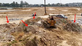 Techniques Operator​ by  Dozer push soil clear land with Heavy Dump trucks  for Development  Country