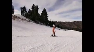 Bikini snowboarder