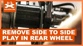 How to remove side to side play in rear wheel