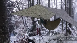Camping in winter on top of the mountain  - hammock tarp campfire