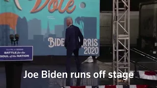 Biden runs off-stage as rain cuts rally short