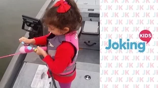 Little girl catches big fish with little Pole CUTE