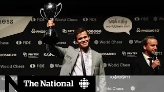 Norwegian grandmaster holds onto chess world championship