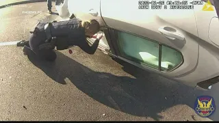 Phoenix officer's bodycam shows moments man was saved from burning car