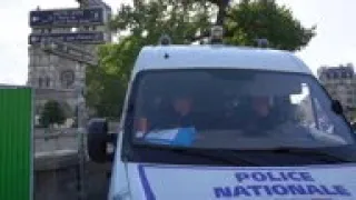 Workers prepare decontamination around Notre Dame