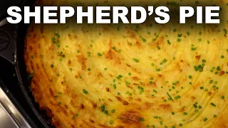 Shepherd's Pie in a cast iron pan | lamb and peas filling, cheesy potato topping